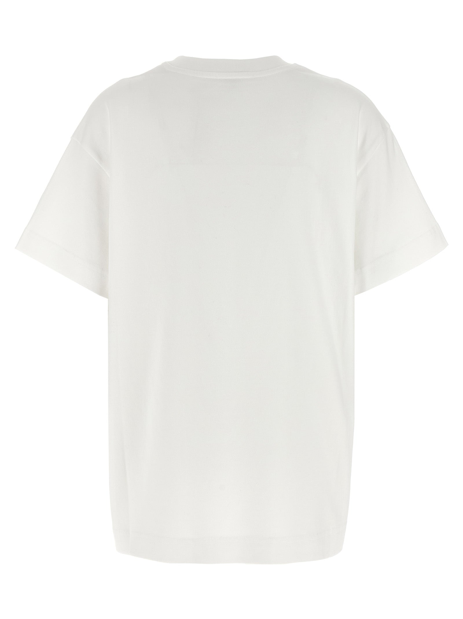 T-shirt blanc en coton Givenchy, coupe classique, avec logo discret sur la poitrine, porté sur un mannequin.