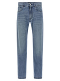 Jeans droit en coton bleu Fendi, style casual, avec fermeture à bouton et poches avant visibles.