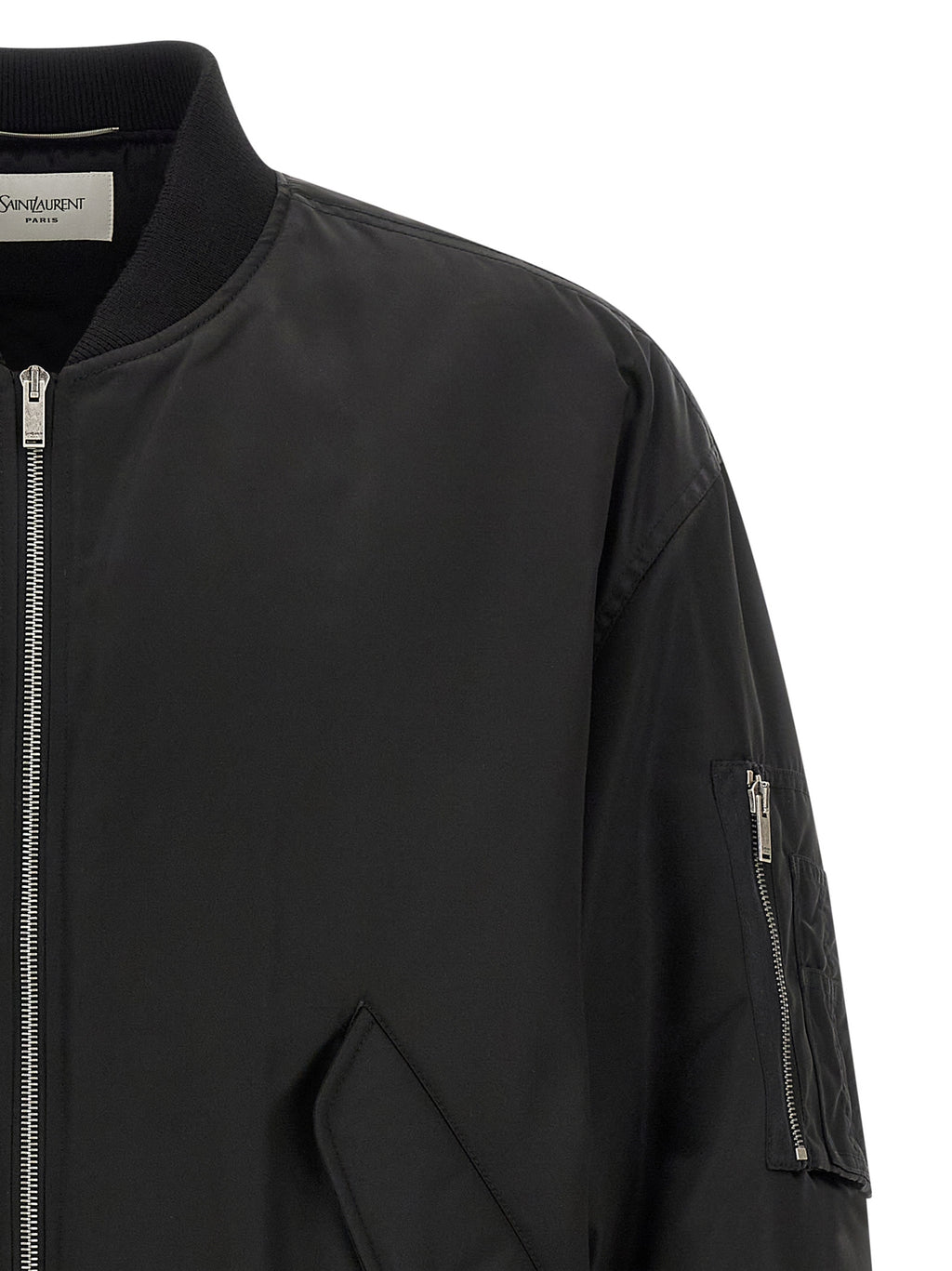 Veste bomber noire en polyamide de Saint Laurent, vue de face, avec détails de design élégants et fermeture éclair visible.