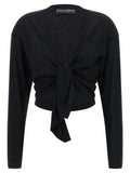 Cardigan en cachemire noir Dolce & Gabbana porté, avec détails élégants, pour homme ou femme, en gros plan.