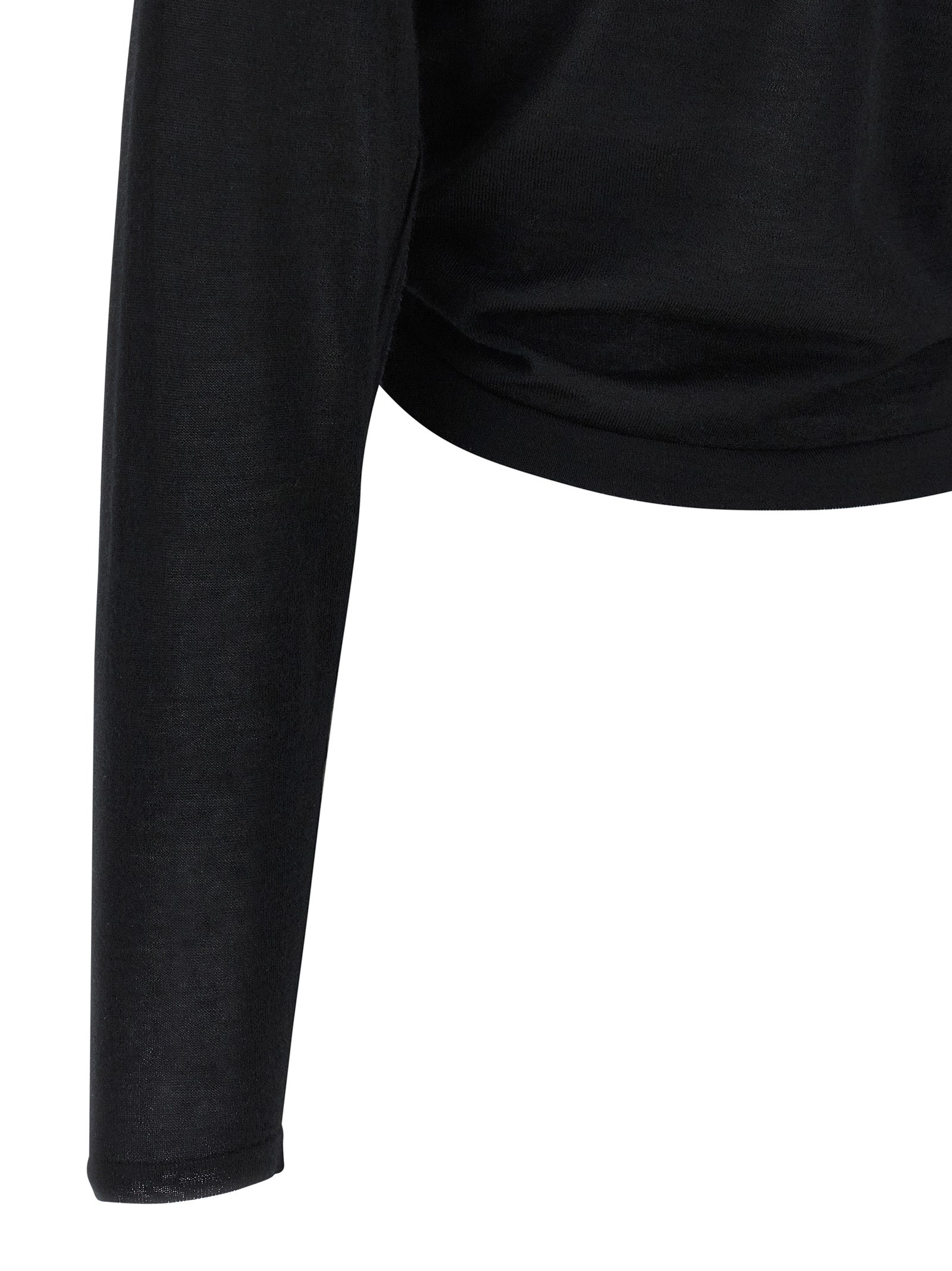 Cardigan noir en cachemire de Dolce & Gabbana, douce texture et coupe élégante, porté sur un mannequin.