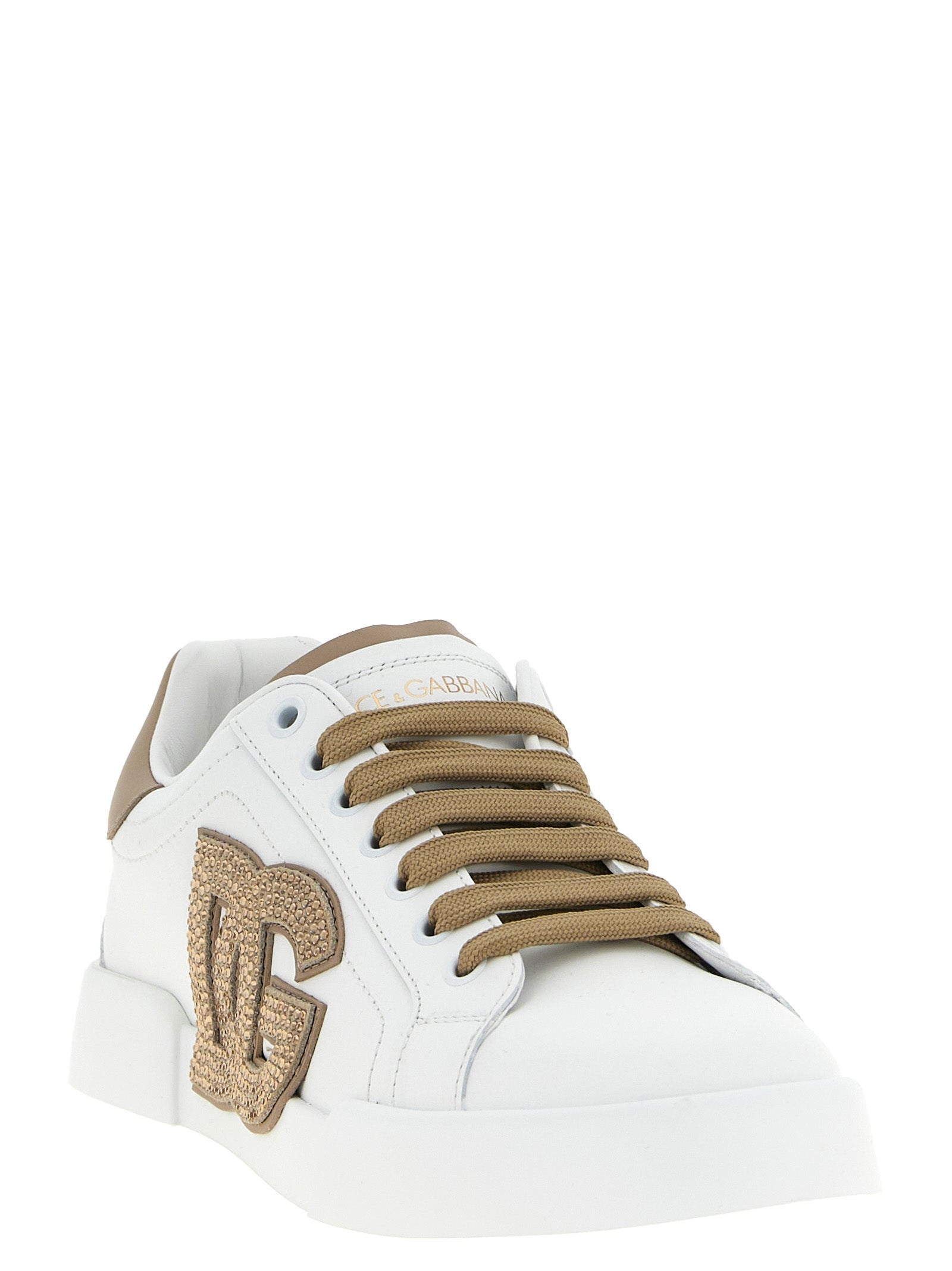 Sneakers beige en cuir de veau Dolce & Gabbana avec semelle blanche, vue de face.
