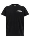 T-shirt en coton bicolore Dsquared², coupe décontractée, avec logo discret, porté sur un mannequin.