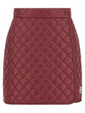 Jupe longue en polyamide bordeaux de Moncler, visible avec finition élégante et coupe fluide.