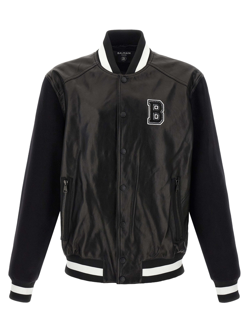 Veste en cuir bicolore en agneau de Balmain, coupe moderne, détails sophistiqués, visible en gros plan sur l'image.
