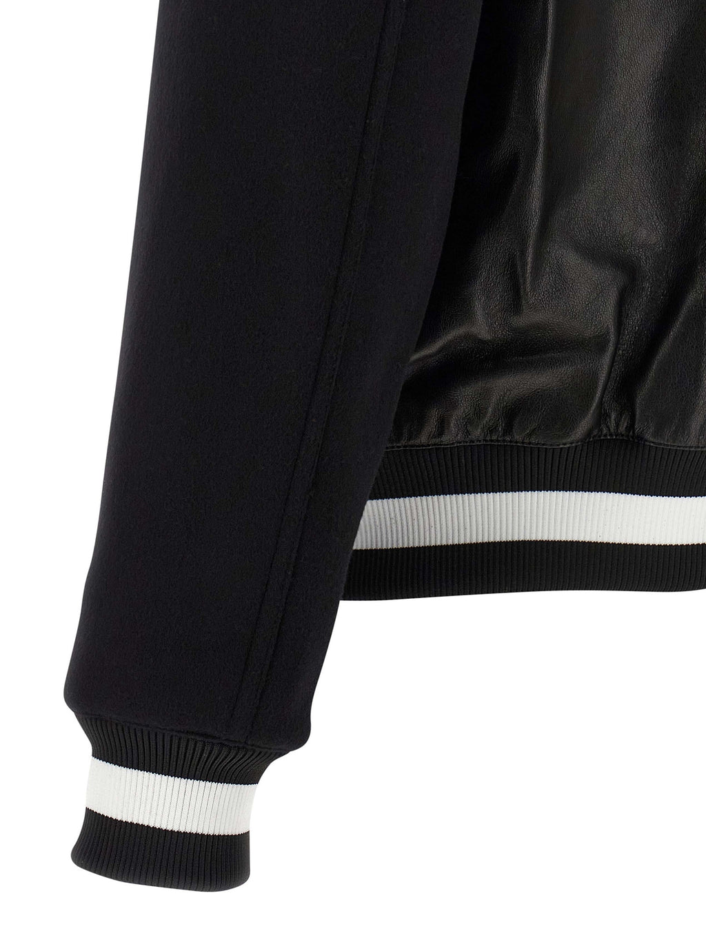 Veste en cuir d'agneau bicolore Balmain, coupe élégante avec détails modernes, visible sur un mannequin.