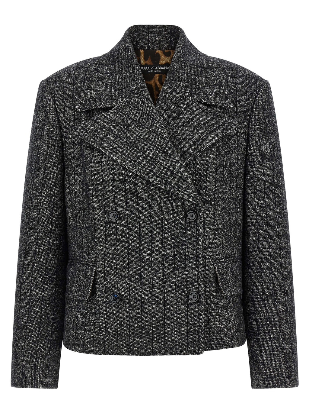 Blazer bicolore en élasthanne de Dolce & Gabbana, coupe élégante avec détails modernes, porté sur un mannequin.