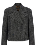 Blazer bicolore en élasthanne de Dolce & Gabbana, coupe élégante avec détails modernes, porté sur un mannequin.