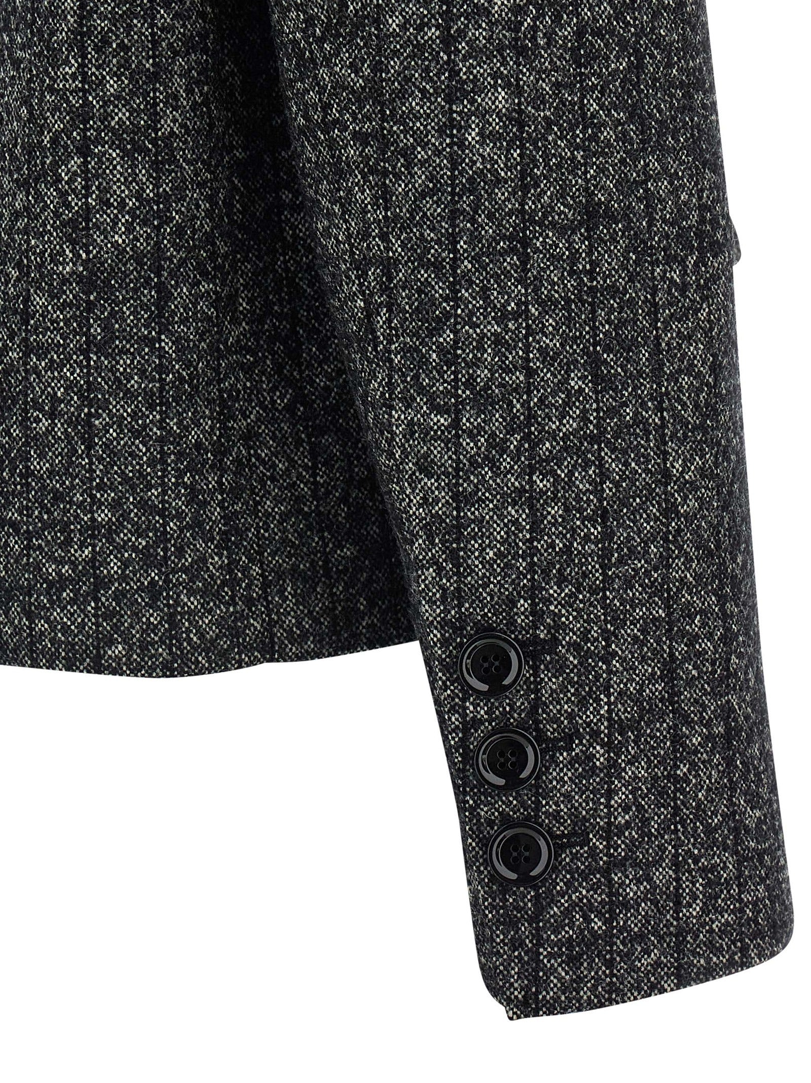 Blazer bicolore en élasthanne Dolce & Gabbana, blazer élégant avec détails contrastants, porté sur un modèle.
