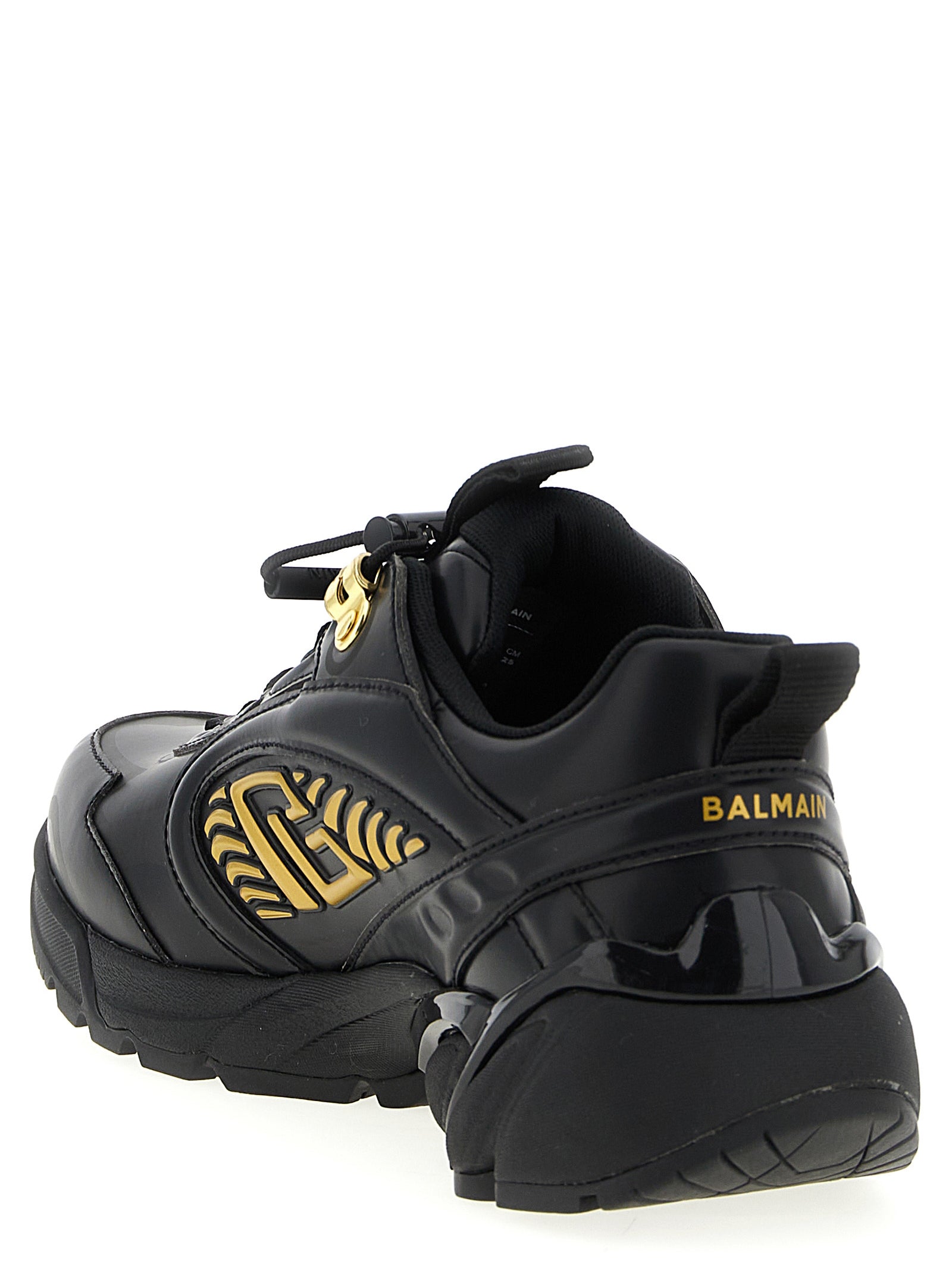 Chaussures de sport Balmain en nylon noir, sneakers athlétiques élégants avec design moderne et semelle blanche.