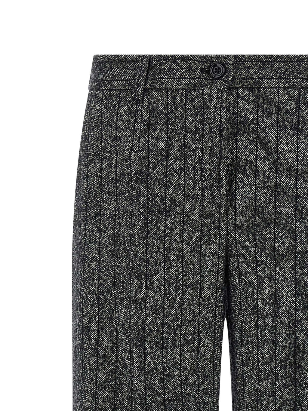 Pantalons décontractés en laine vierge bicolore de Dolce & Gabbana, style élégant et confortable, visibles en gros plan.