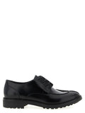 Chaussures oxford et derby en cuir de veau noir Saint Laurent, élégantes et sophistiquées, vues de face.