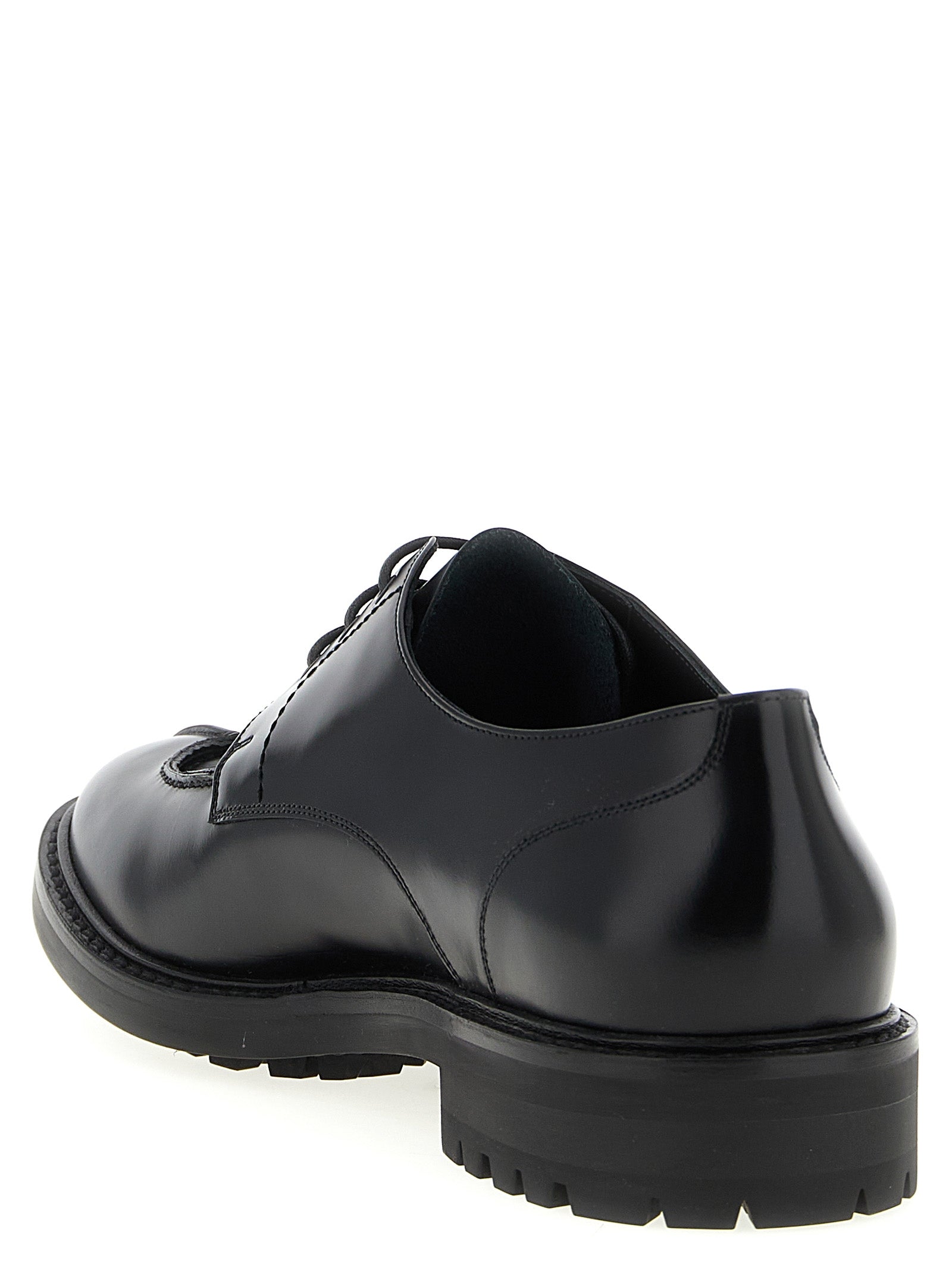 Chaussures oxfords et derbies en cuir de veau noir de Saint Laurent, élégantes et sophistiquées pour homme.