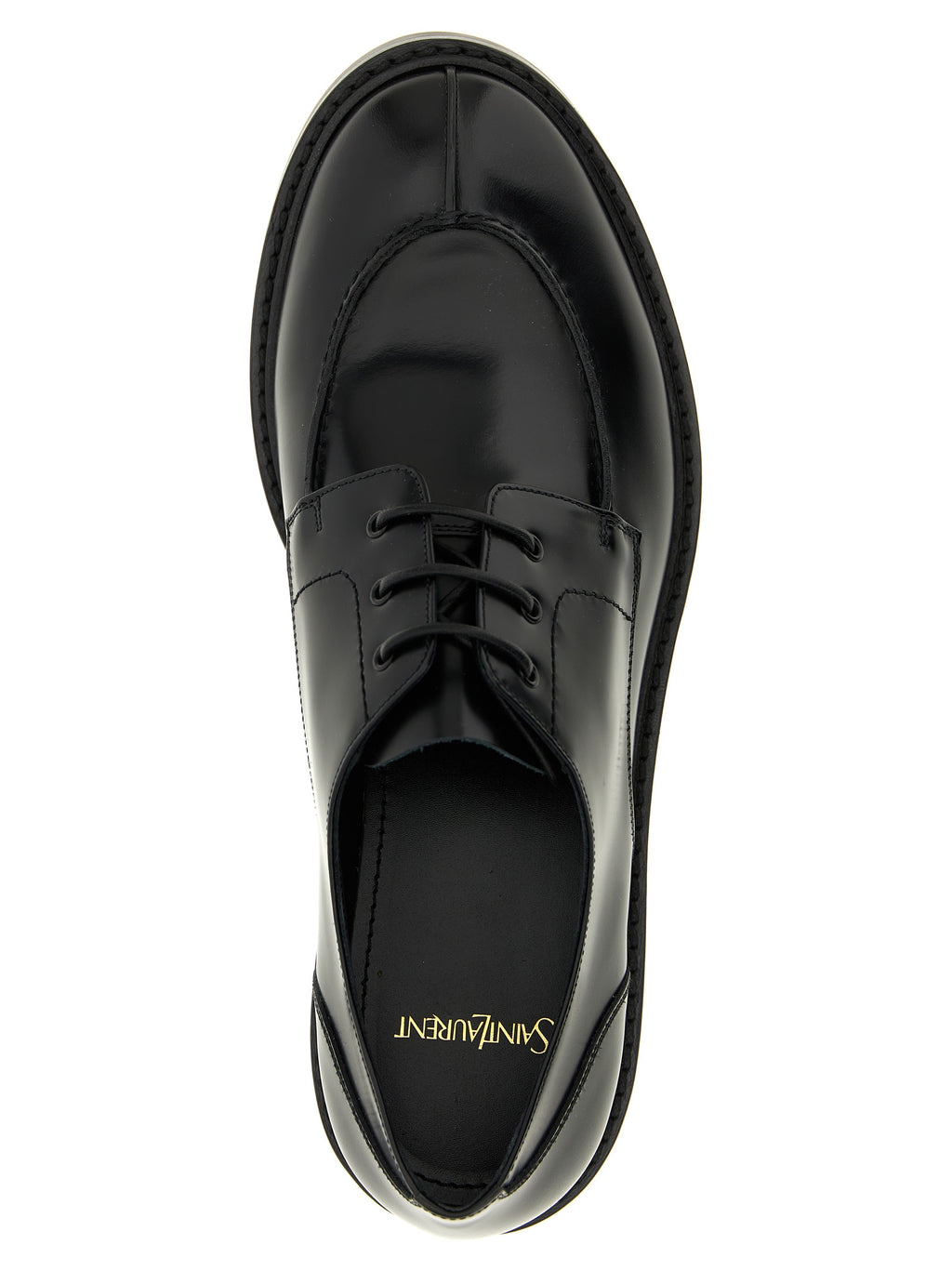 Chaussures oxfords et derbies en veau noir de Saint Laurent, élégantes et sophistiquées, visibles en gros plan.