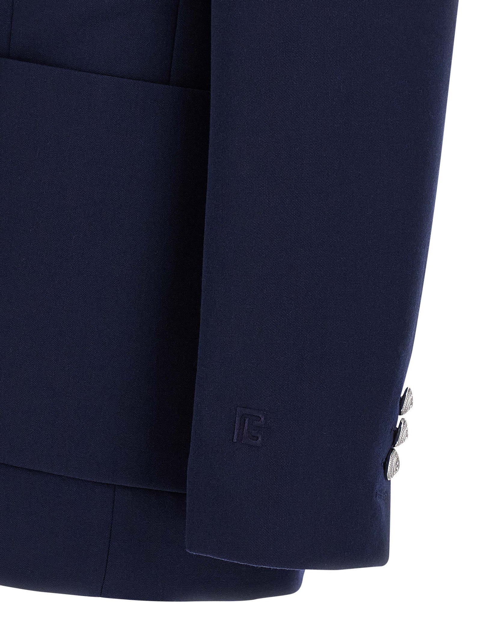 Blazer en laine vierge bleue Balmain, veste élégante avec coupe ajustée et détails sophistiqués, vue de face.