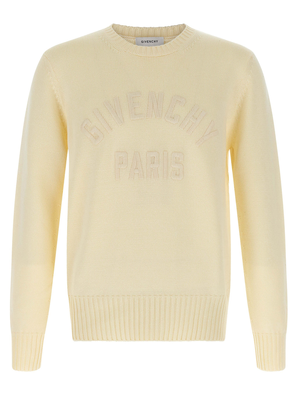 Cardigan en coton beige Givenchy avec boutons, porté décontracté, détail du tissu doux et fini élégant.