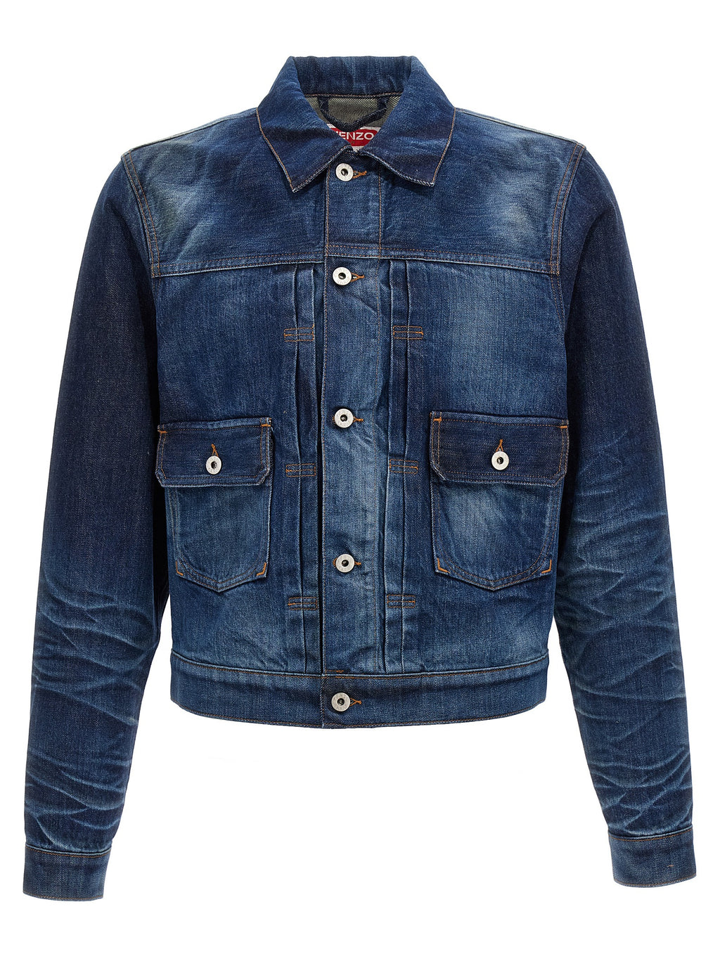 Veste en denim en coton bleu Kenzo, coupe classique avec détails modernes, visible sur le mannequin.