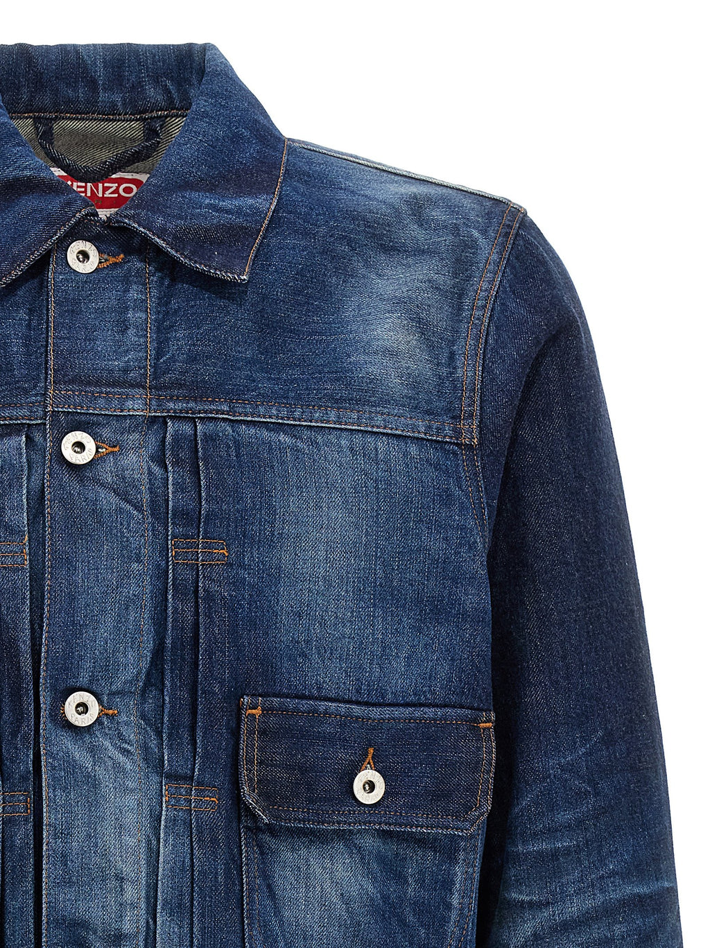 Veste en denim en coton bleu de la marque Kenzo, vue de face, avec détails de couture et boutons en métal.
