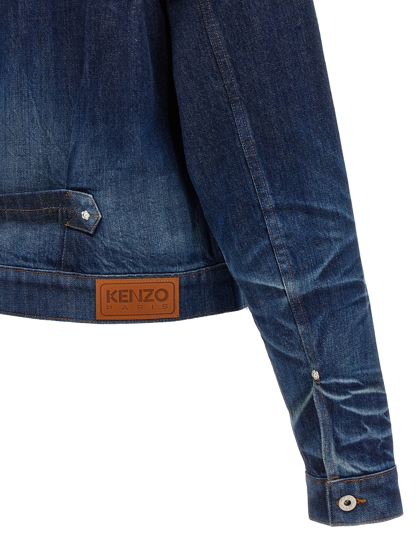 Veste en denim en coton bleu de la marque Kenzo, style décontracté avec détails de couture visibles.
