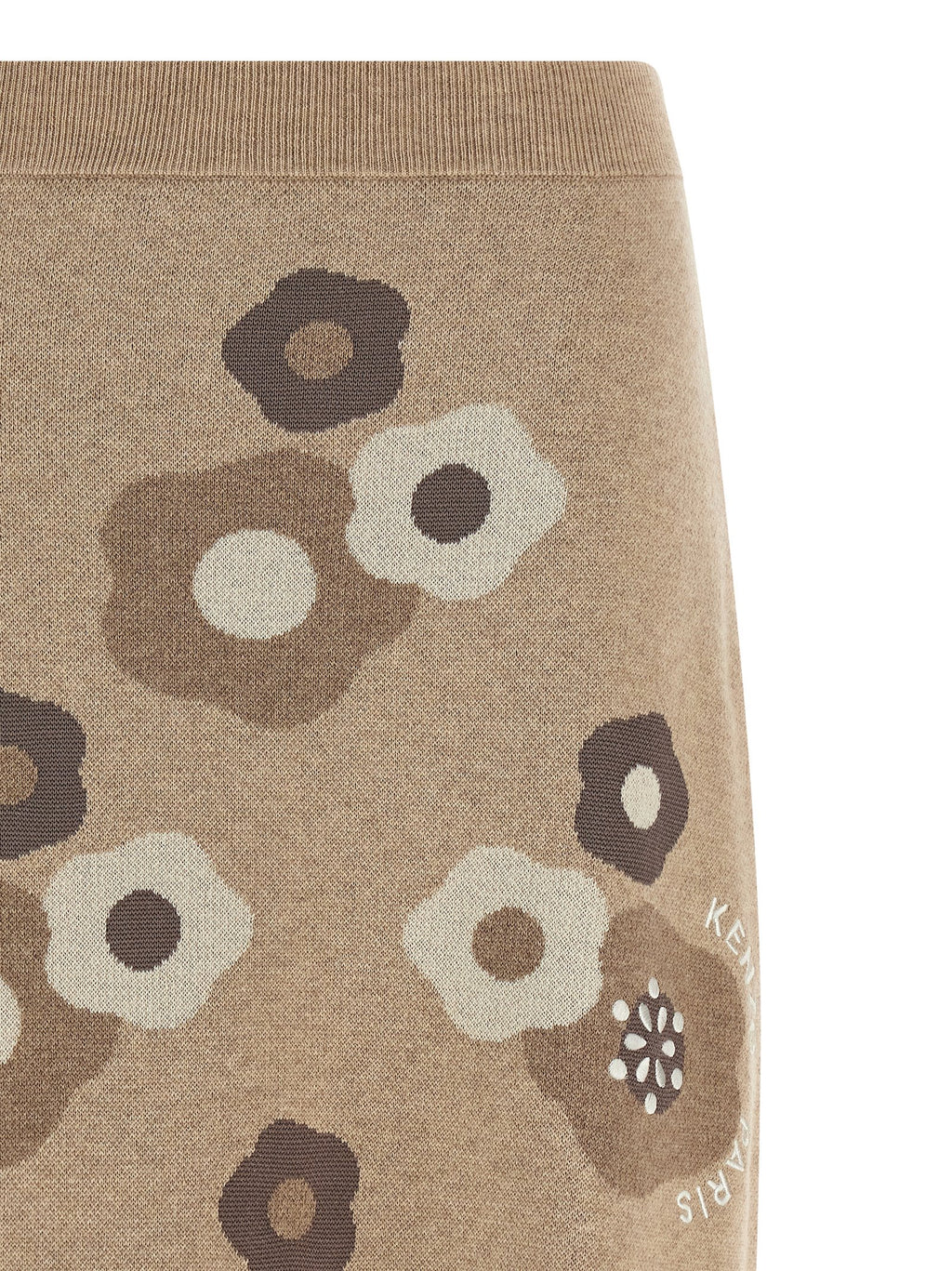 Jupe longue en laine beige de Kenzo, coupe élégante et tissu doux, portée avec style.