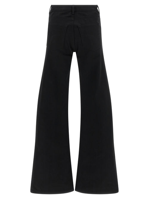Jeans évasés en coton noir de la marque Balenciaga, silhouette décontractée et style moderne.