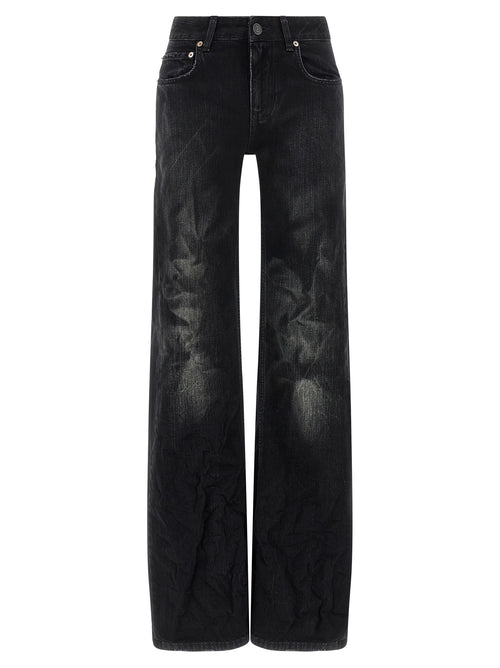 Jean évasé en coton noir de Balenciaga, coupe décontractée et tendance, avec détails de style modernes.