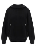Cardigan en coton noir de Balenciaga, détails du tissu et coupe élégante visible sur l'image.