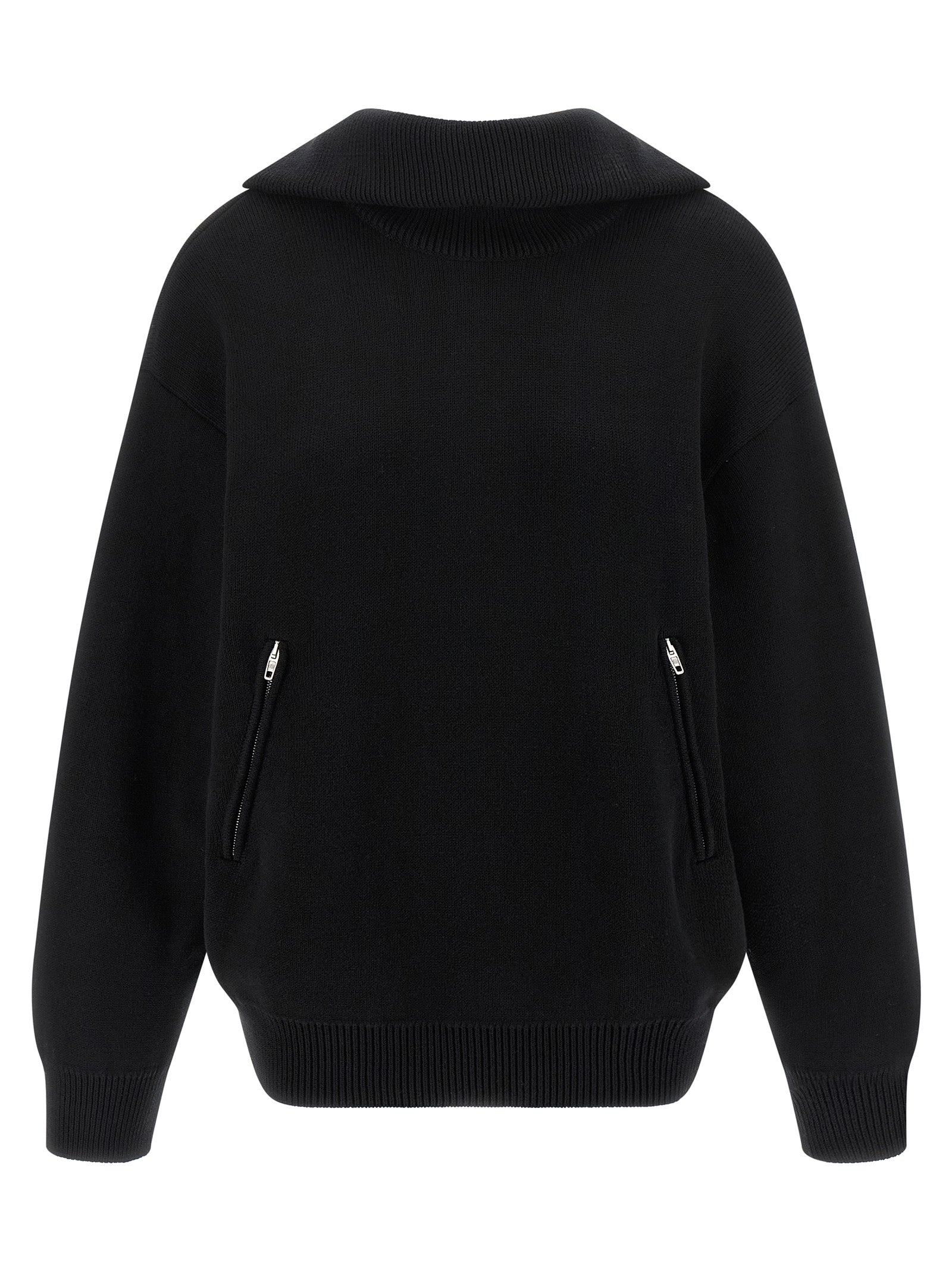 Cardigan en coton noir de Balenciaga, détails du tissu et coupe élégante visible sur l'image.