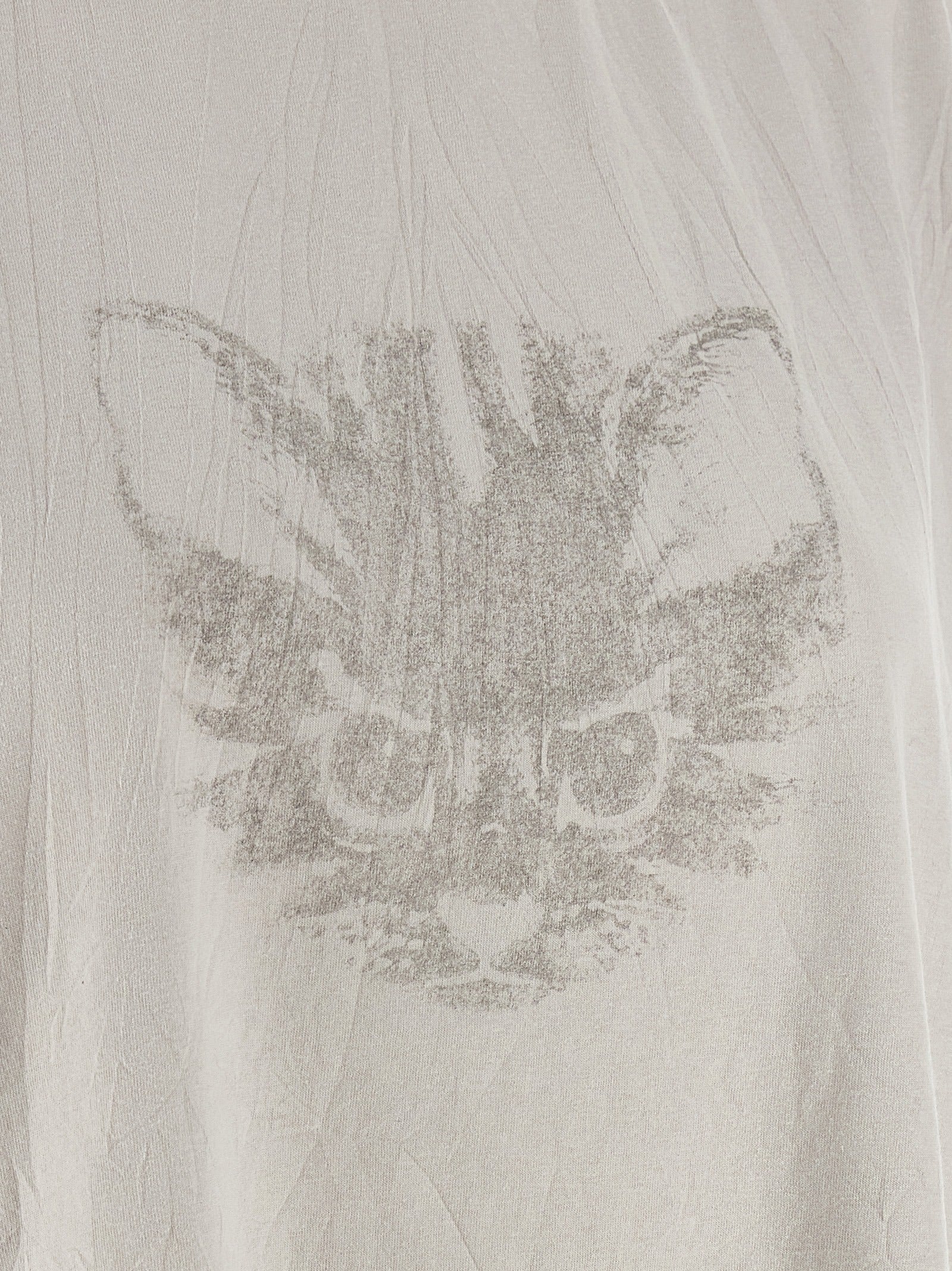 T-shirt blanc en coton de la marque Balenciaga, coupe classique et logo discret visible sur le devant.