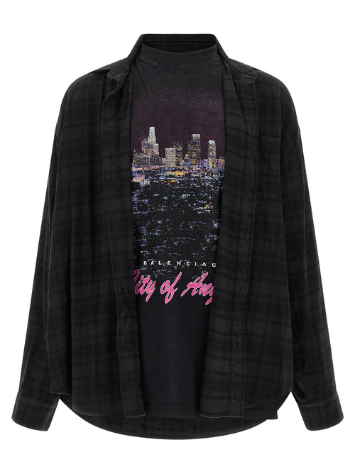 Chemise en coton noir Balenciaga, style élégant, avec détails sophistiqués, portée décontractée ou chic.