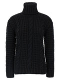 Cardigan en laine vierge noire de la marque MONCLER GENIUS, porté avec col en V et boutons, pour un look élégant et décontracté.