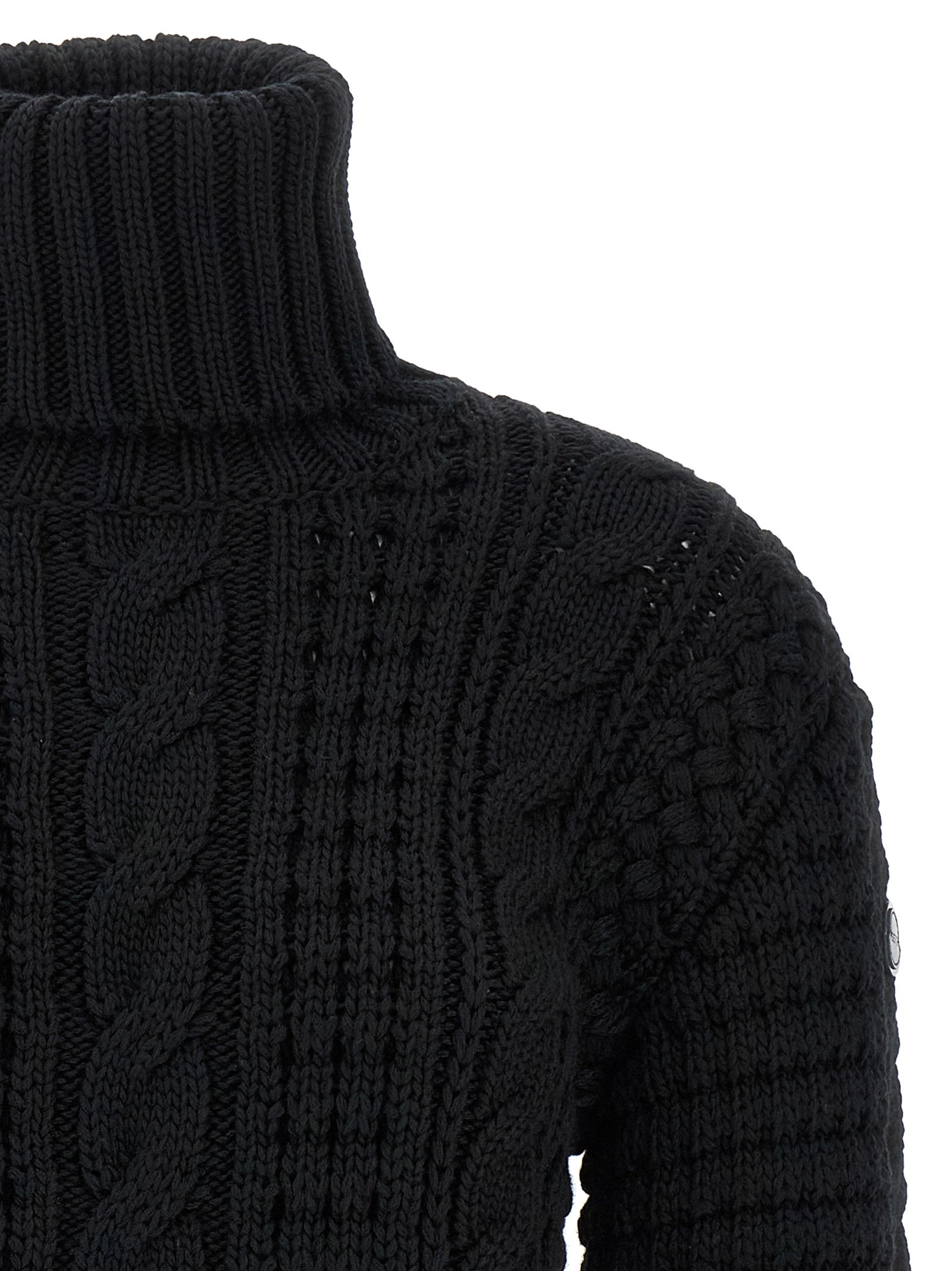 Cardigan noir en laine vierge de MONCLER GENIUS, avec détails élégants et coupe classique pour homme ou femme.