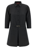 Robe courte en laine grise de Gucci, design élégant avec coupe ajustée et détails sophistiqués, portée sur mannequin.