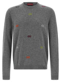 Cardigan en cachemire gris Gucci, vêtement élégant avec détails sophistiqués, porté sur un mannequin.