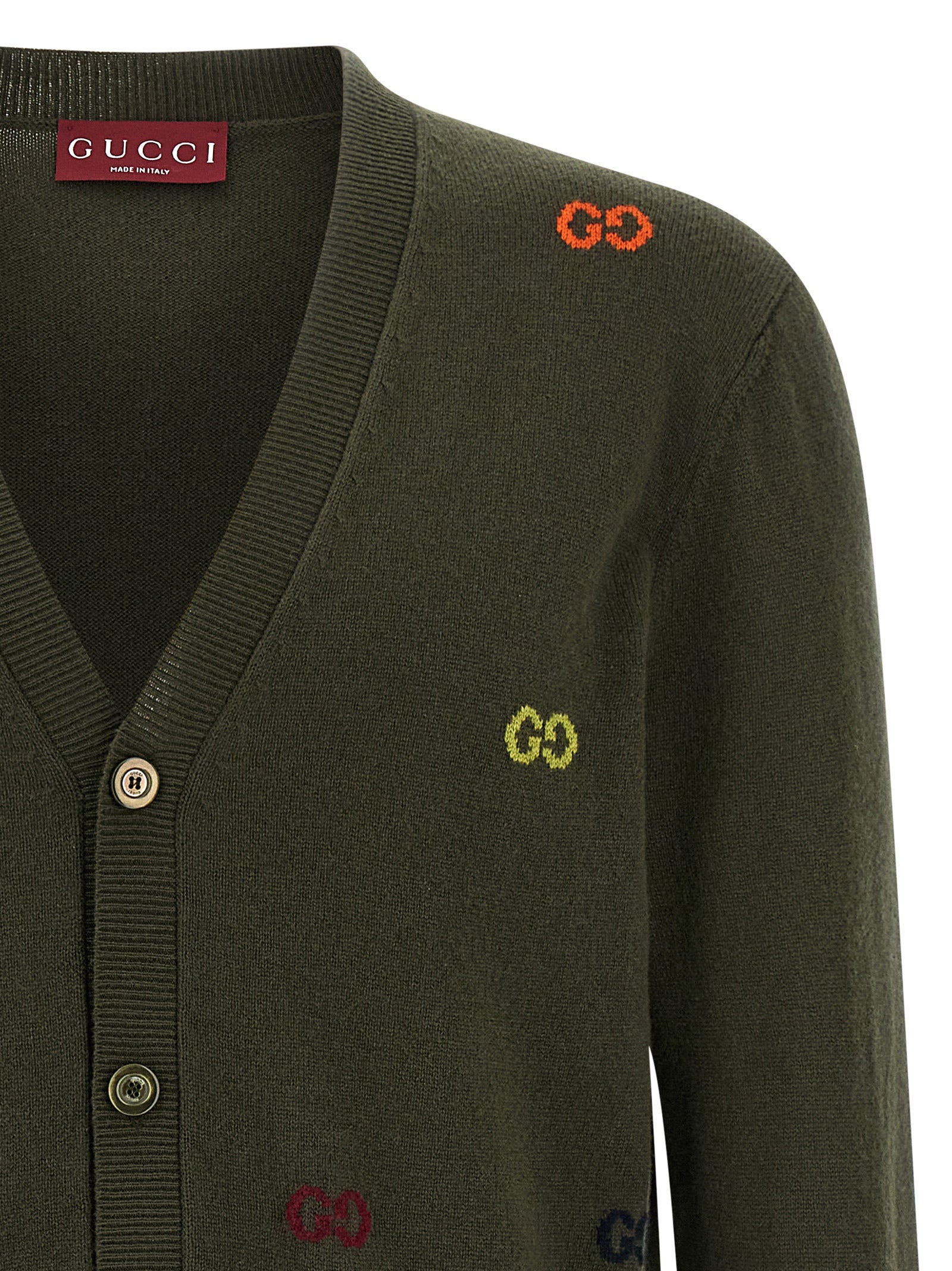 Cardigan bicolore en cachemire Gucci, vue de face, avec boutons et détails élégants, pour un look sophistiqué et confortable.