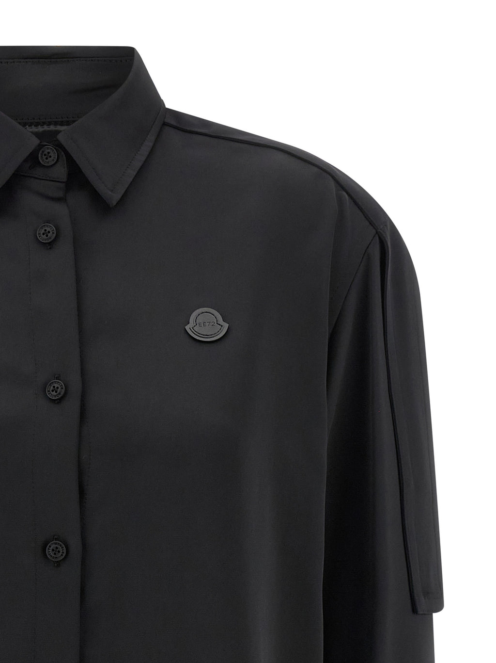 Blouse en polyester noir de la marque Moncler Genius, vue de face, détails du tissu et coupe élégante.
