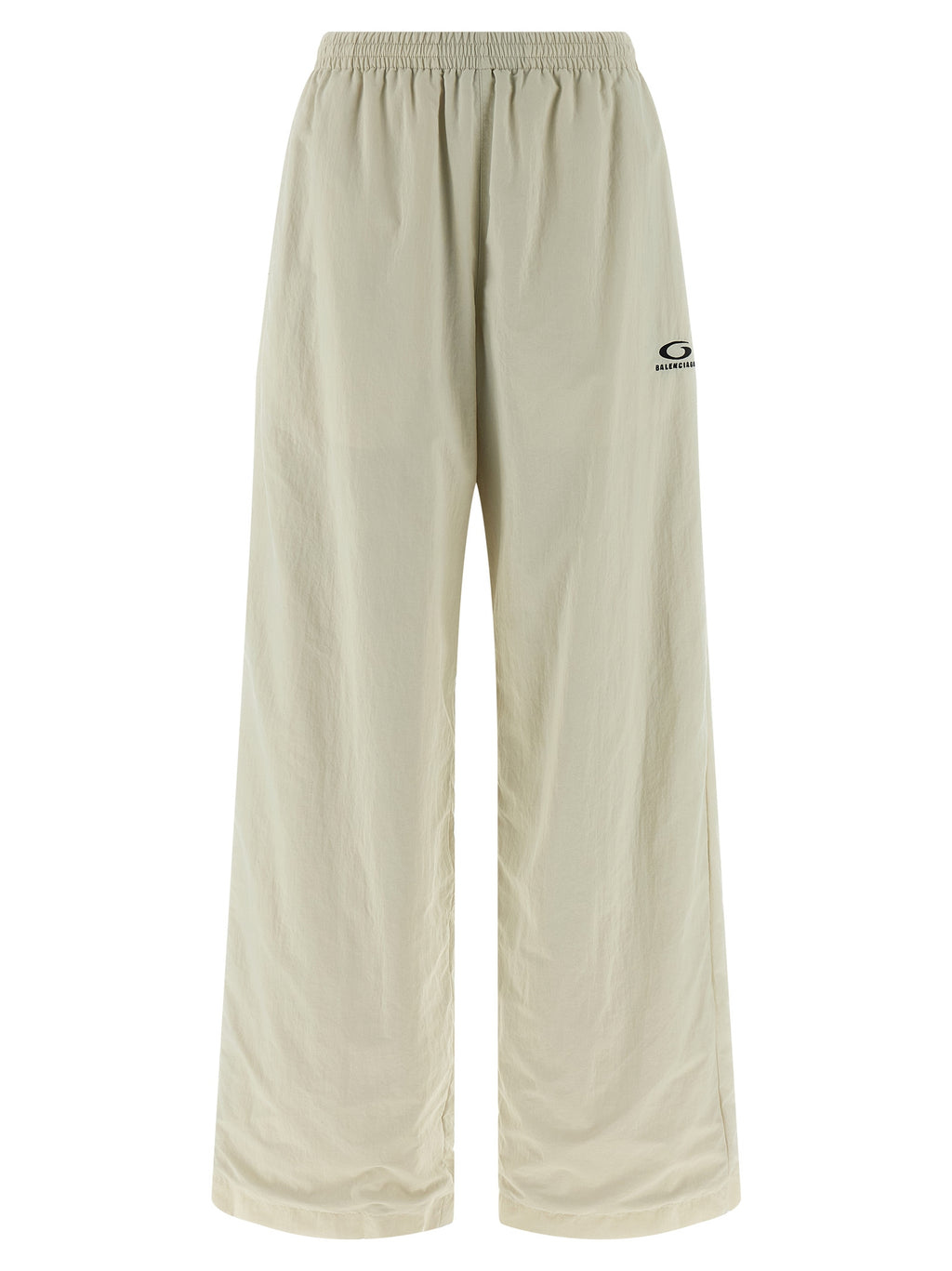 Pantalons de jogging beige en polyamide de Balenciaga, style décontracté, avec ceinture élastique et poches latérales visibles.