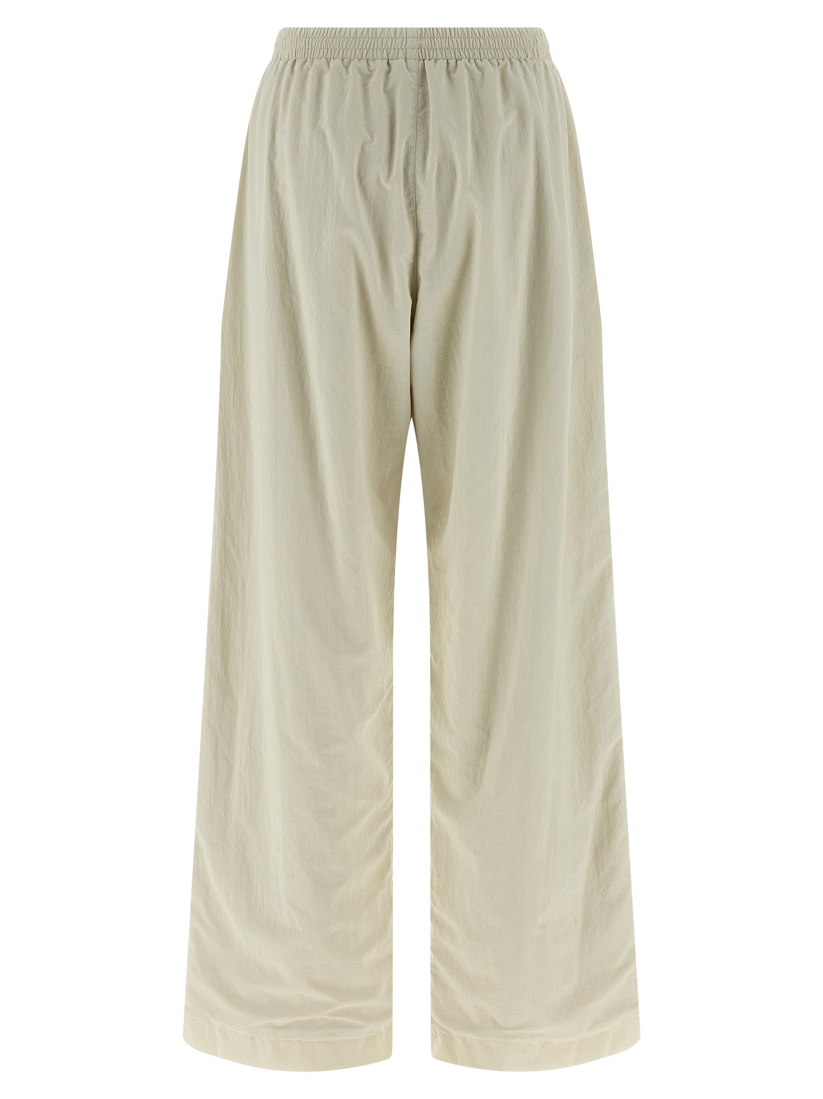 Pantalons de jogging beige en polyamide Balenciaga, style décontracté pour le sport ou la détente, avec détails modernes.