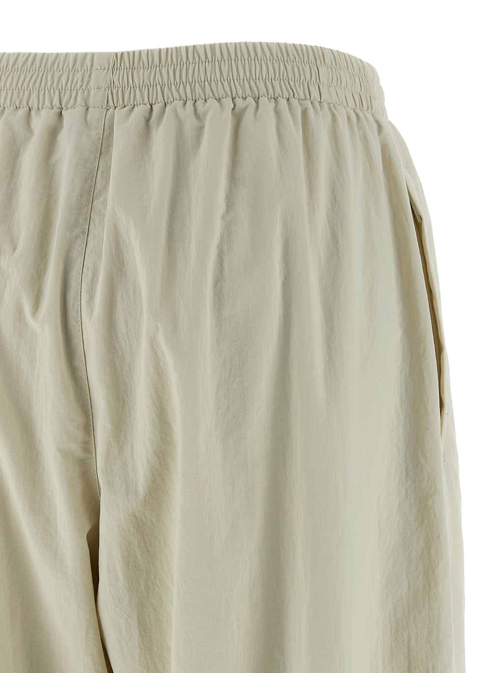 Pantalons de sport beige Balenciaga en polyamide, joggers décontractés pour l'entraînement et le style casual.