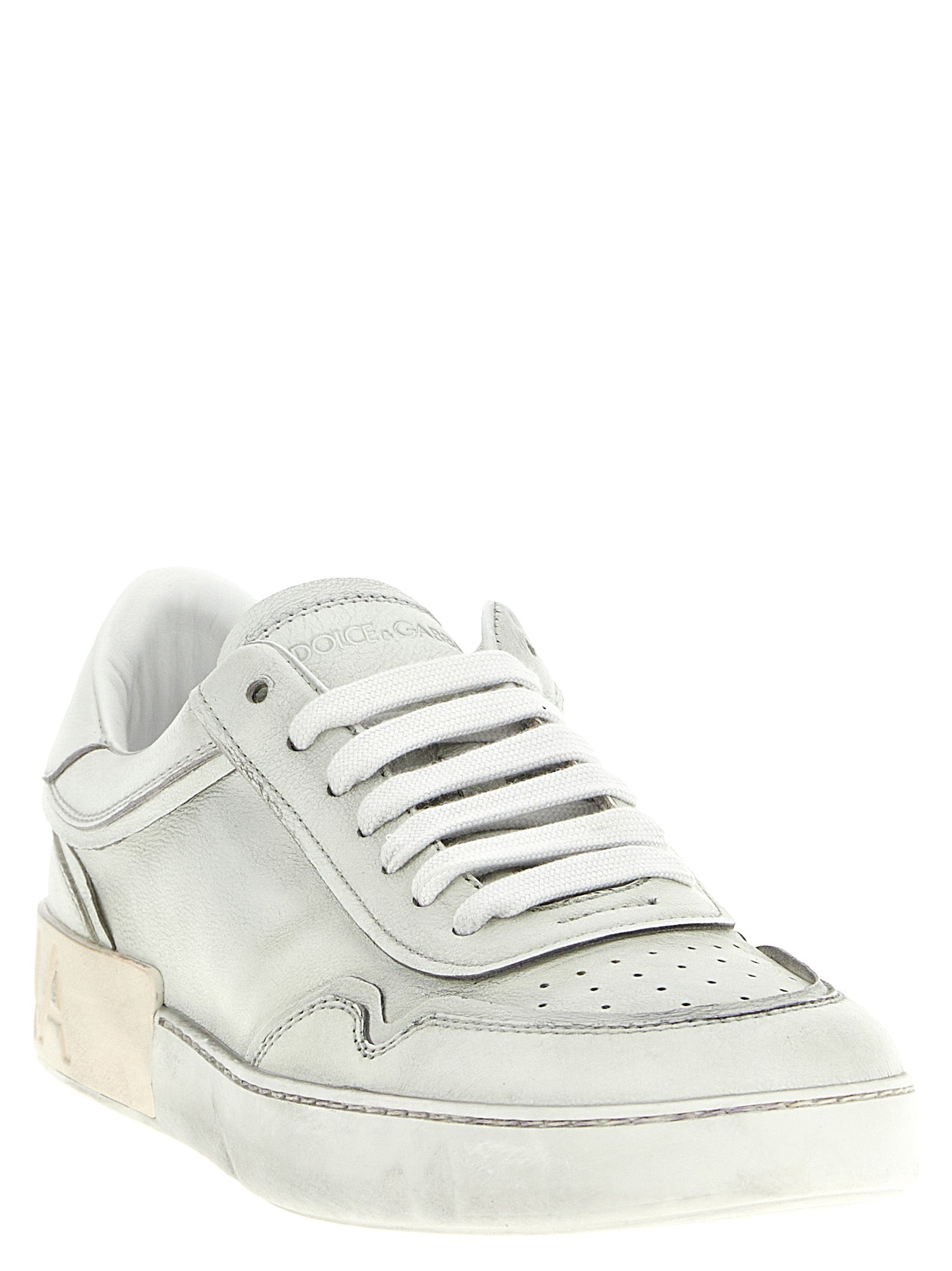 Chaussures basses en cuir d'agneau blanc de Dolce & Gabbana, sneakers décontractés avec design élégant.