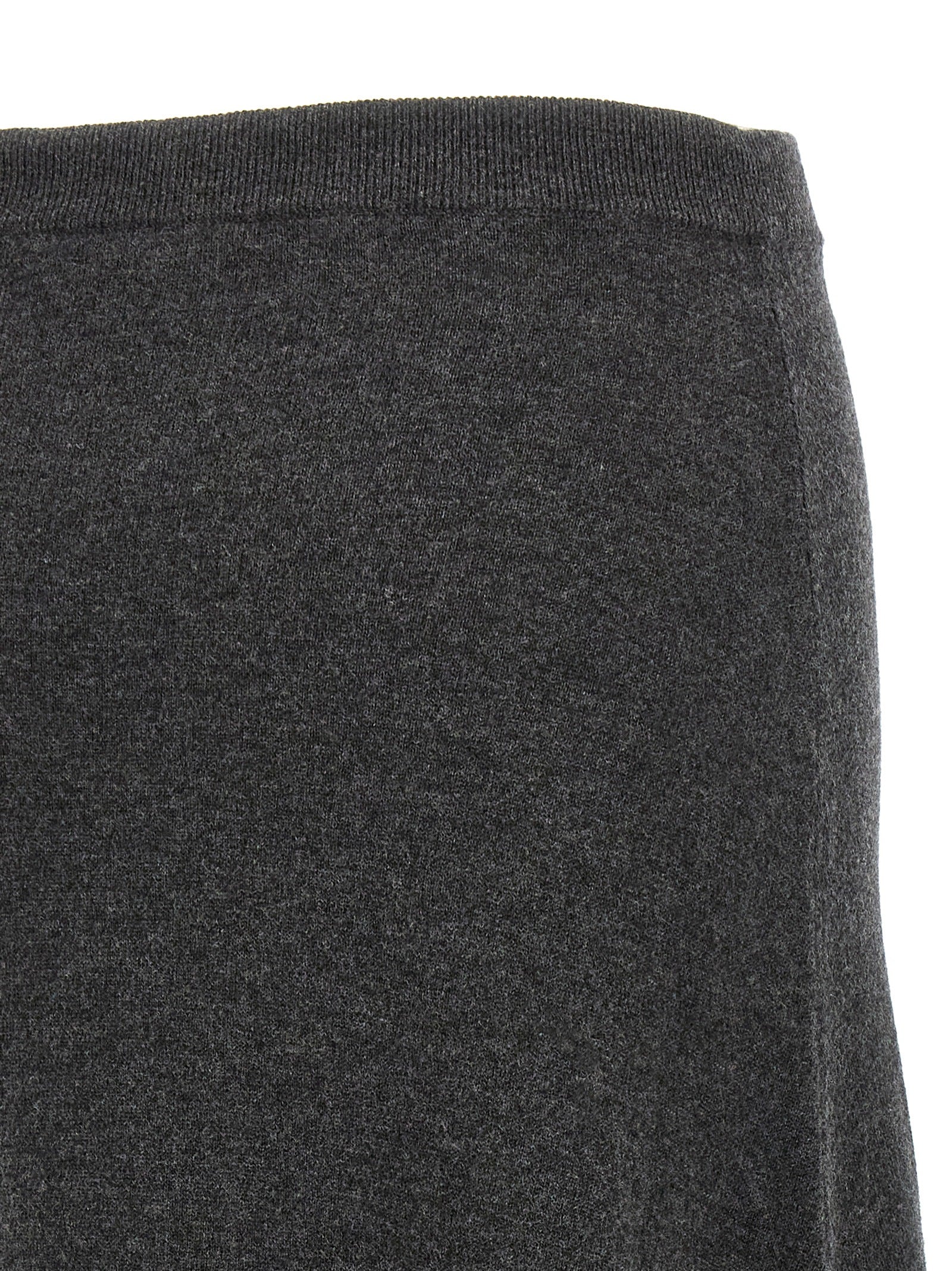 Jupe courte gris en laine Balenciaga, coupe mini, avec détails élégants et texture douce visible sur l'image.