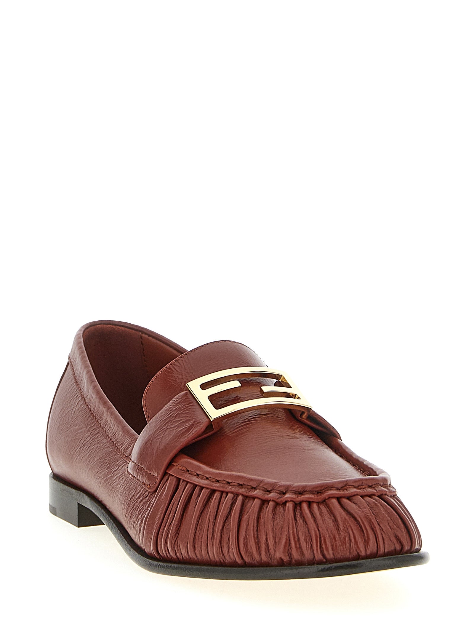 Chaussures Fendi en cuir d'agneau brun, mocassins slip-on élégants pour hommes, avec finition soignée et design sophistiqué.