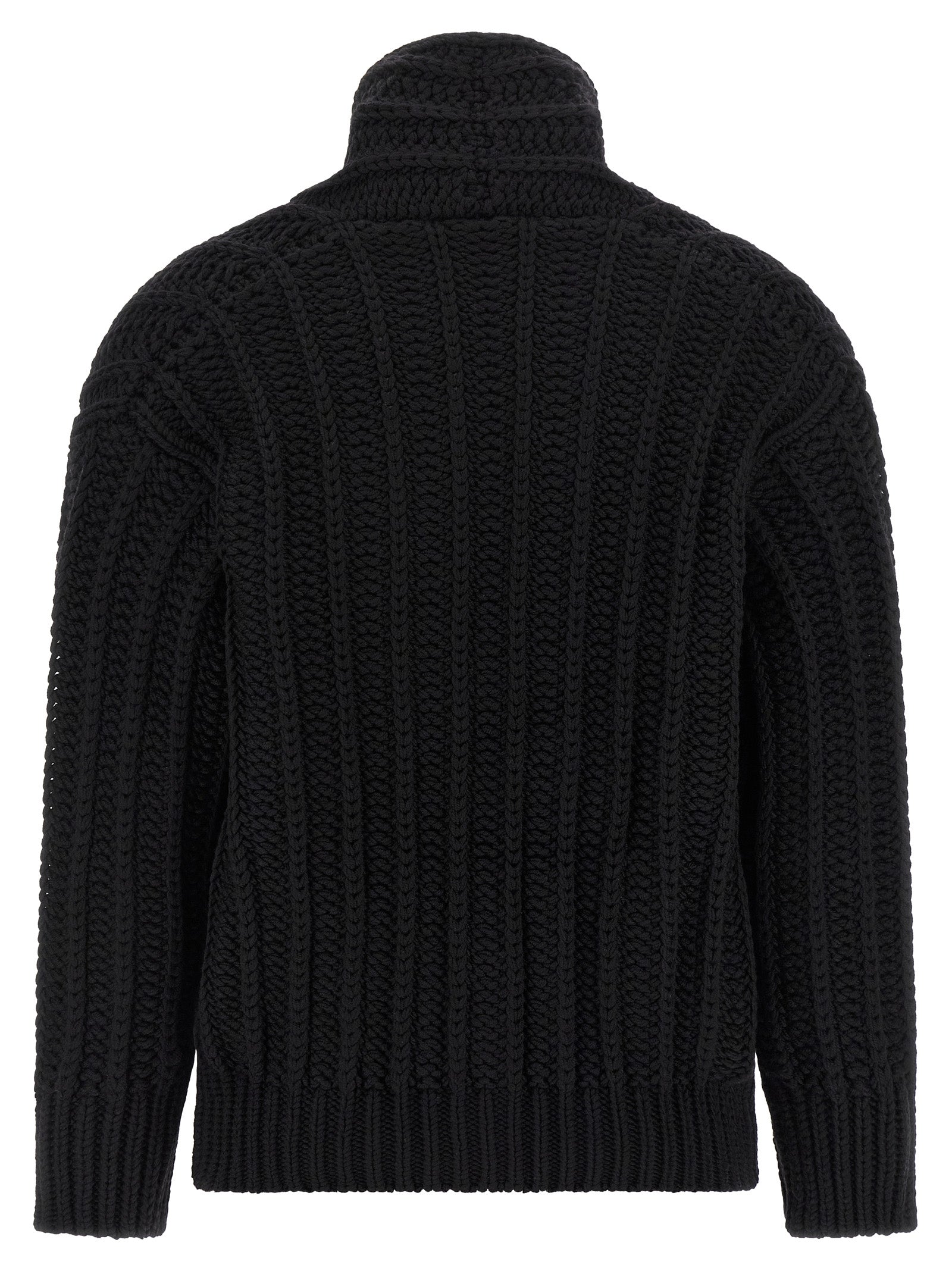 Cardigan en laine vierge noire Dolce & Gabbana, style élégant avec boutons, porté sur un mannequin.