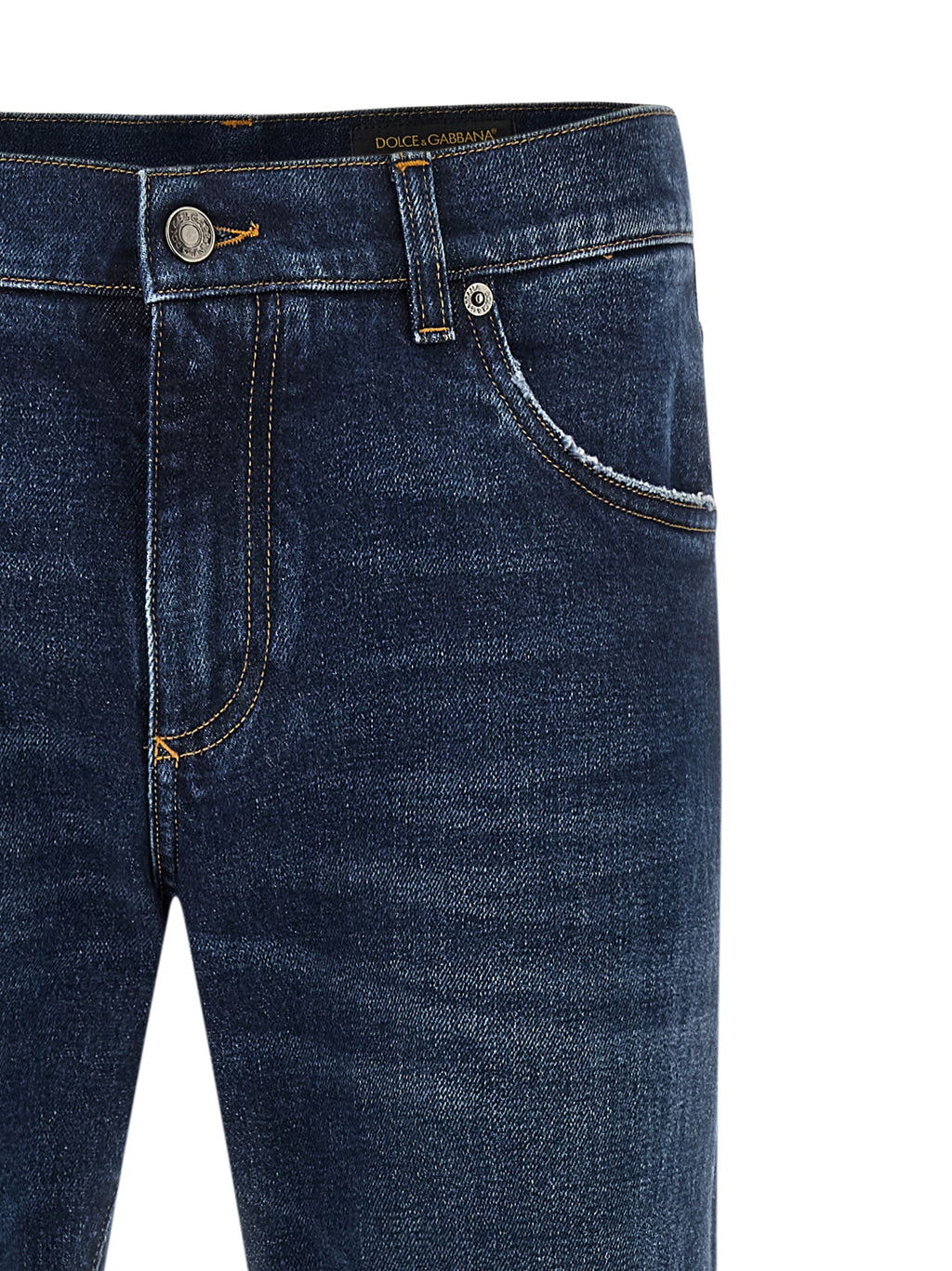 Jeans droits en coton bleu Dolce & Gabbana, style classique, visible en détail sur fond neutre.
