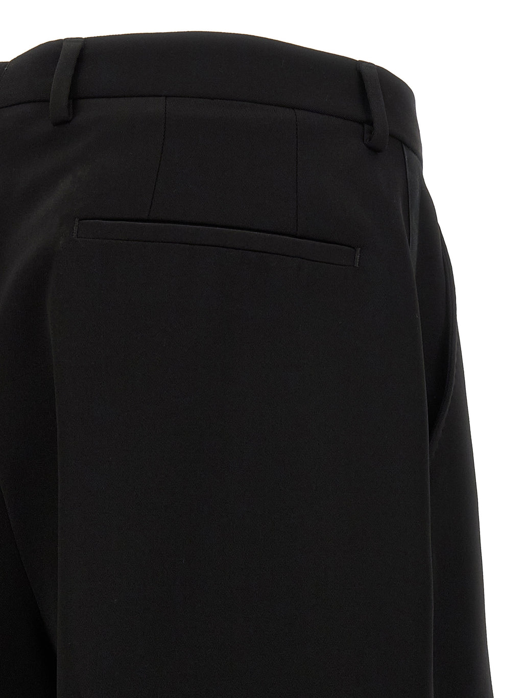 Pantalon noir en laine vierge de Dolce & Gabbana, coupe élégante et sophistiquée, pour homme ou femme.