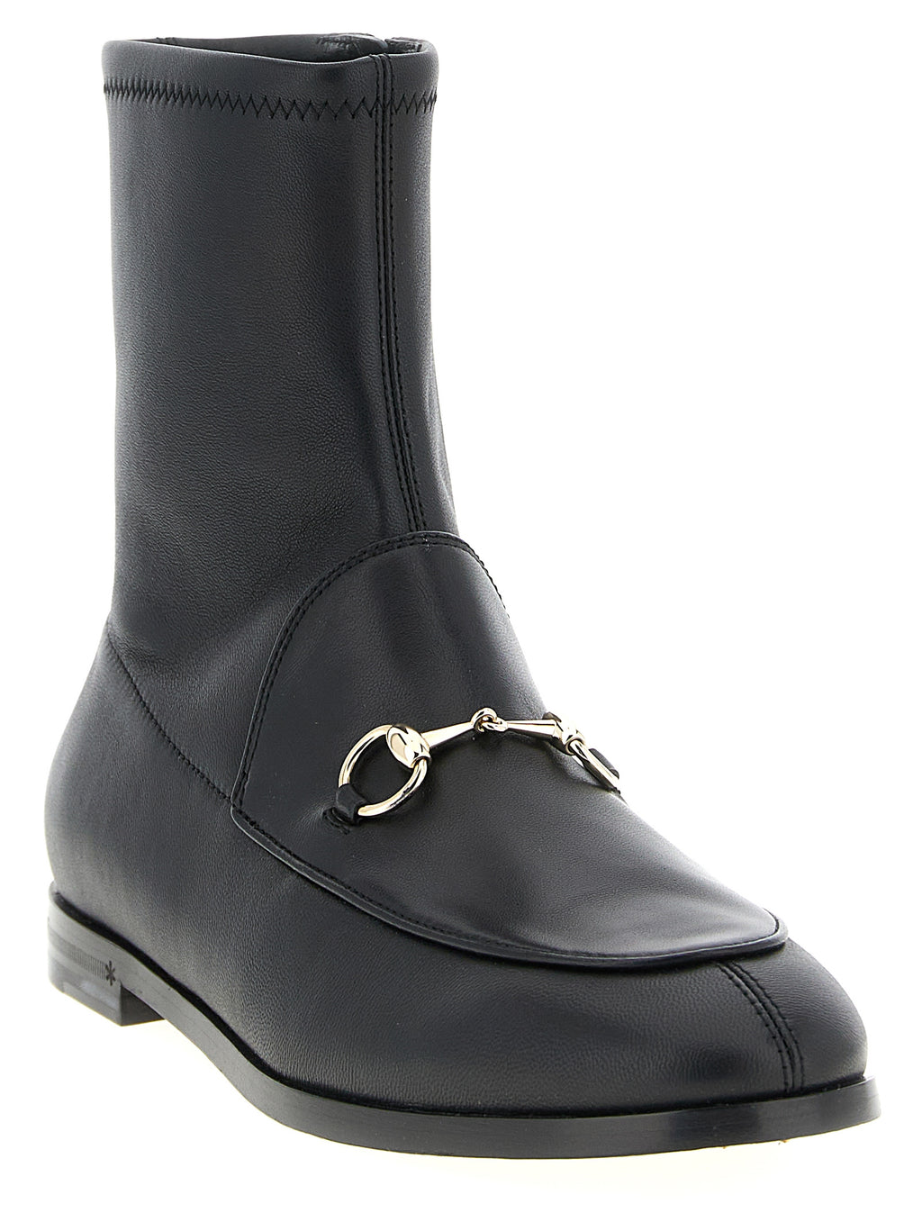 Bottines noires en cuir d'agneau Gucci, chaussures à la cheville élégantes avec talon et détails raffinés.