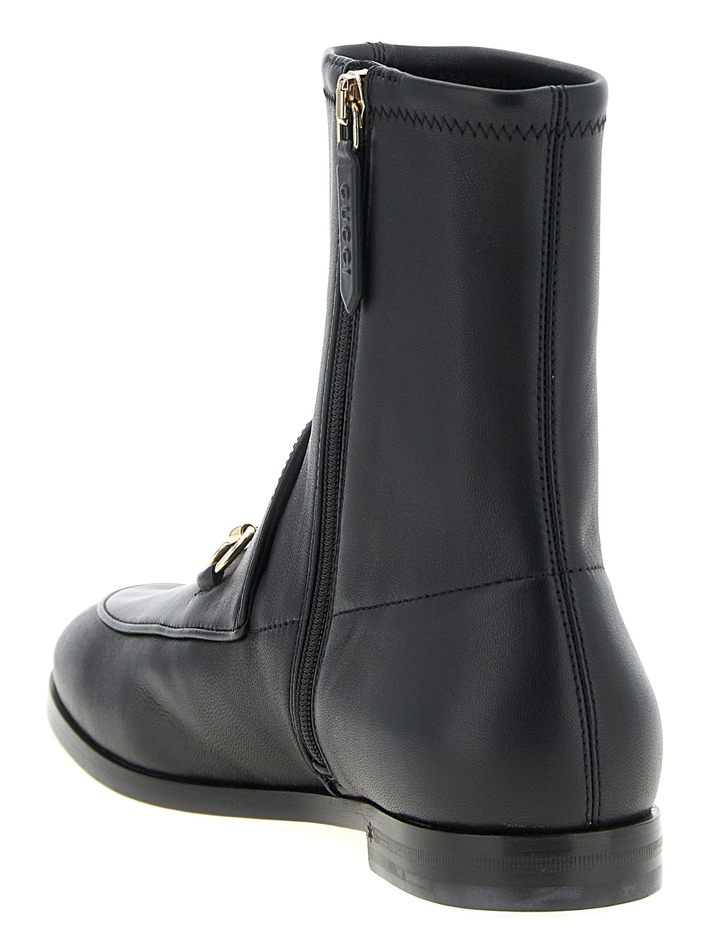 Bottes ankle en cuir d'agneau noir Gucci, élégantes, avec semelle en cuir et design sophistiqué.