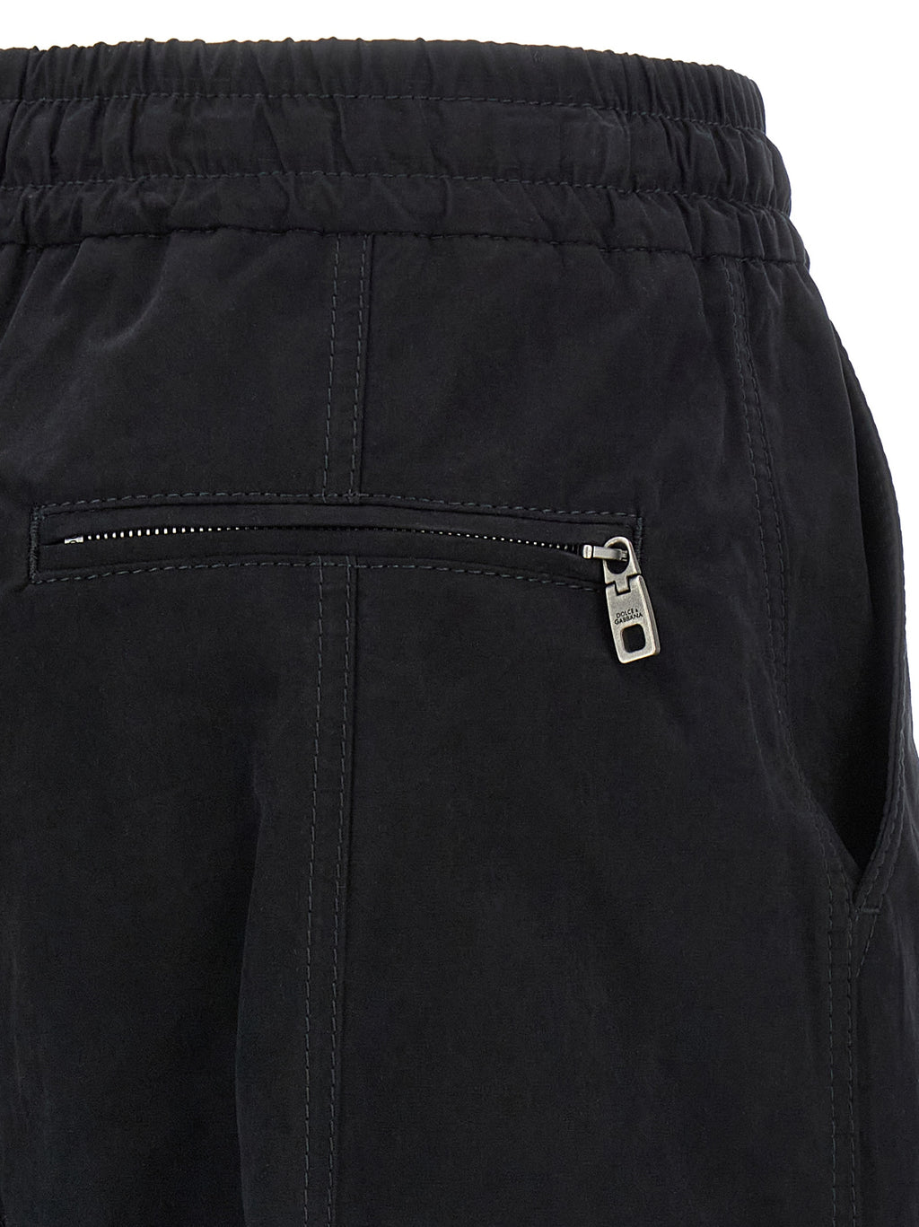 Pantalon cargo en coton noir de Dolce & Gabbana, style décontracté, avec poches latérales et coupe moderne.