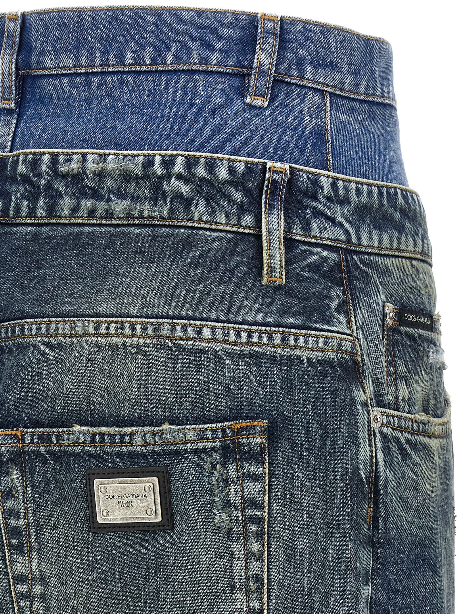 Jeans en jean en coton bleu Dolce & Gabbana, coupe classique, visible avec détails de couture et fermeture éclair.