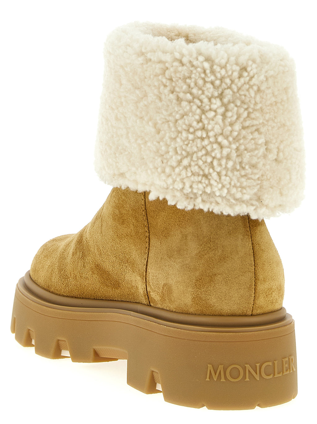 Bottes d ankle en veau beige Moncler pour femmes, style élégant et confortable, visibles sur cette image.
